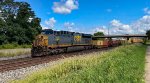 CSX 702 leads another I135.